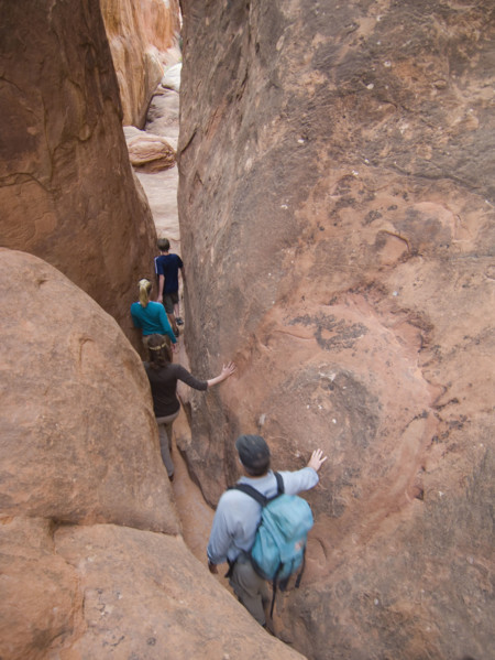 People walking through rock formations. Date : 2007