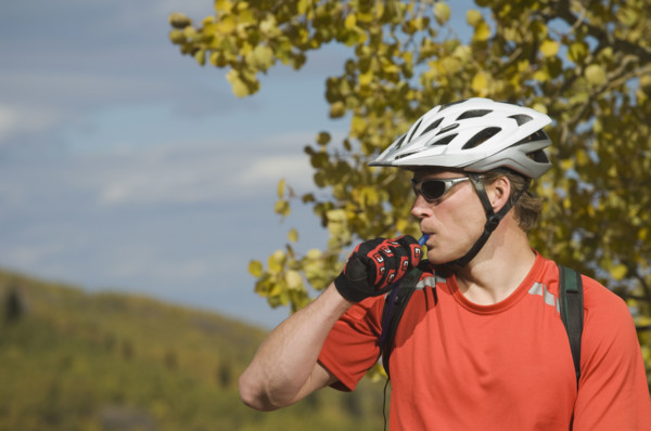 Man wearing bicycle helmet, Utah, United States. Date : 2007