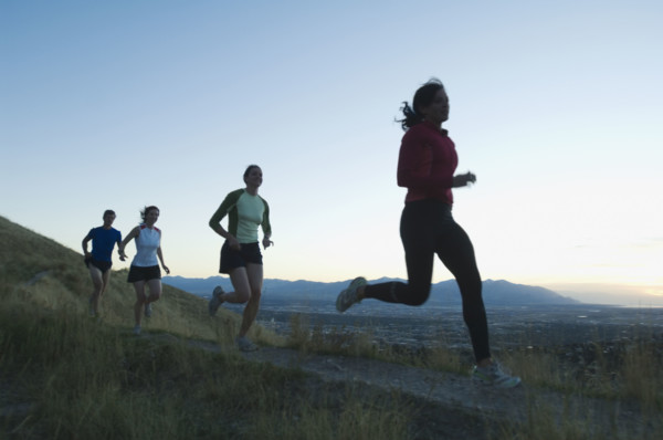 Group of people running on trail, Salt Flats, Utah, United States. Date : 2007