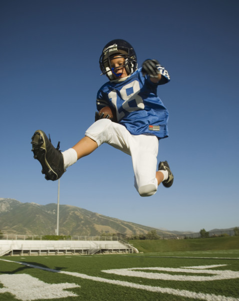 Young football player jumping. Date : 2007