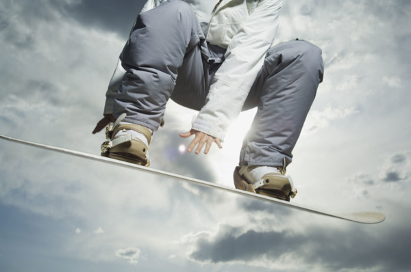 Low angle view of snowboarder. Date : 2007