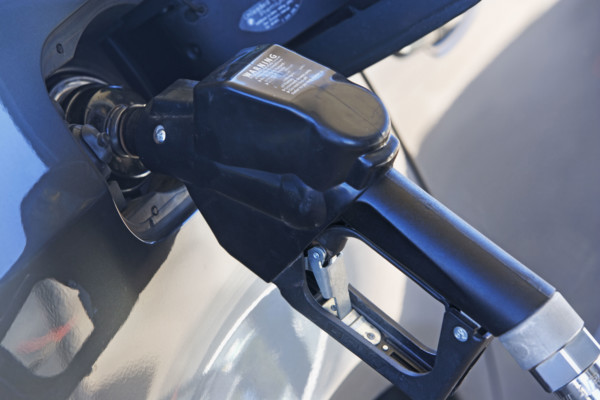 pumping gas in a car. Date : 2007