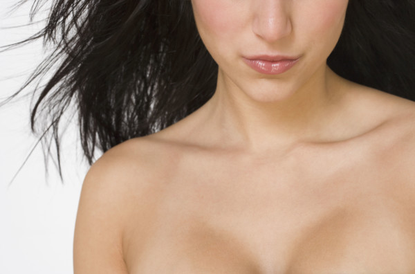 Close up of bare shouldered woman.