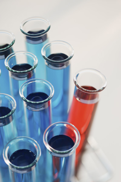 Vials of liquid in tray.