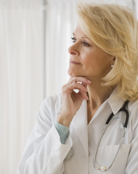 Female doctor thinking .