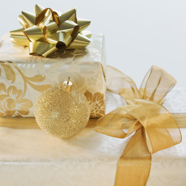 Ornament on pile of gifts.