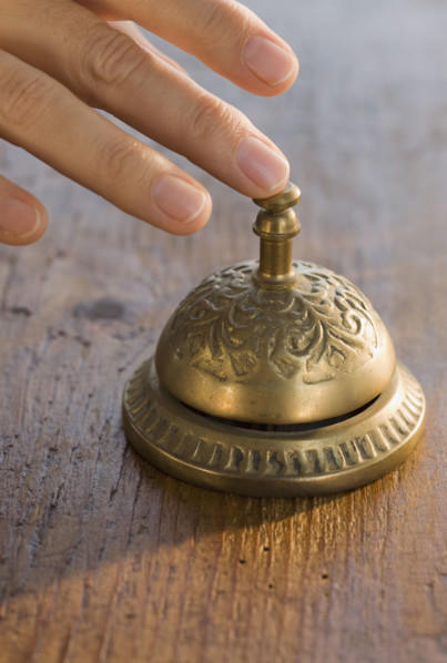 Man ringing service bell.