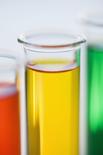 Multi-colored liquids in vials.