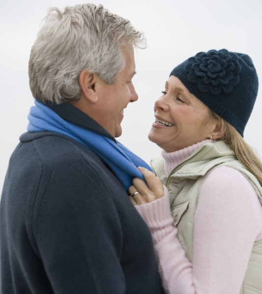 Couple smiling at each other.