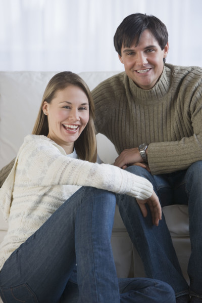 Couple sitting in livingroom.