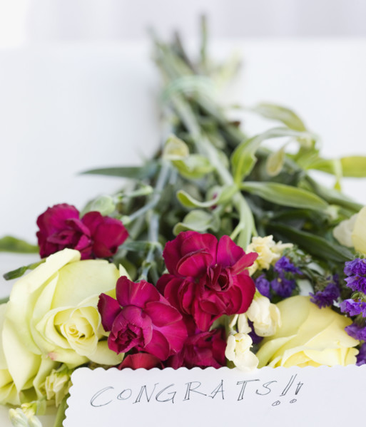 Close up of flower bouquet and note. Date : 2008