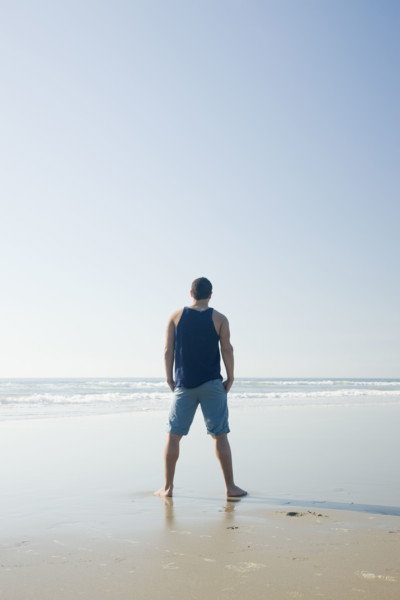 Man standing on beach. Date : 2008