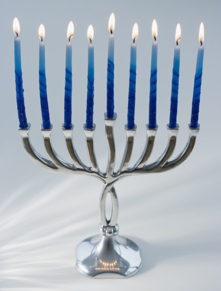 Close up of menorah with lit candles. Date : 2008