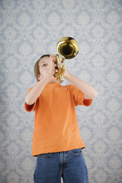 Boy playing trumpet. Date : 2008