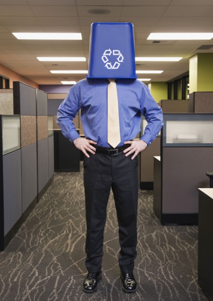 Businessman with recycling bin on head. Date : 2008