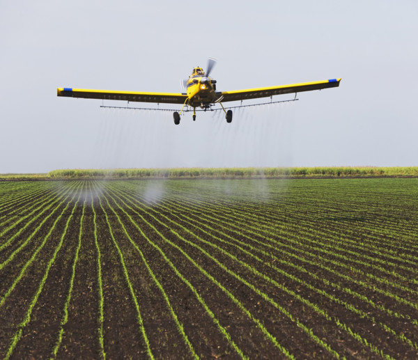 crop-duster plain over field. Date : 2008