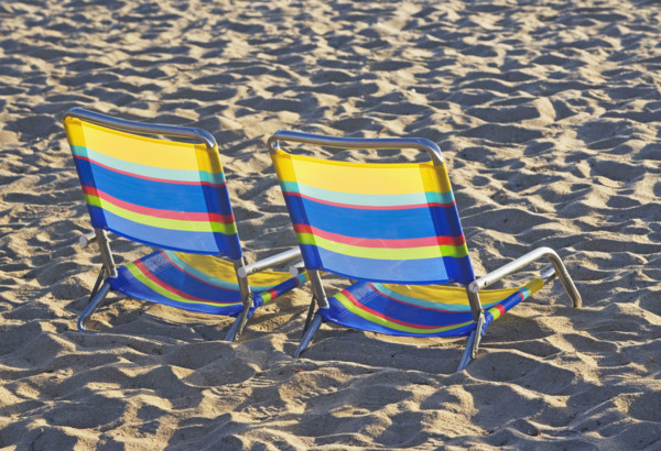 Empty beach chairs on sand. Date : 2008