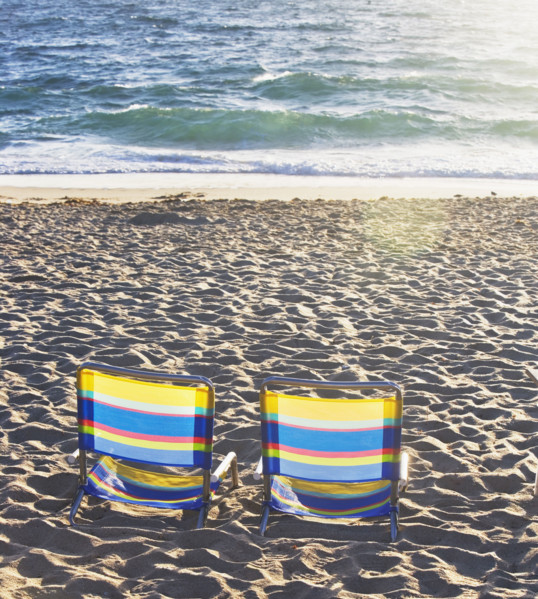 Empty beach chairs on sand. Date : 2008