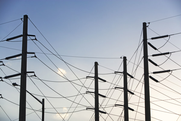 Low angle view of power lines on poles. Date : 2008