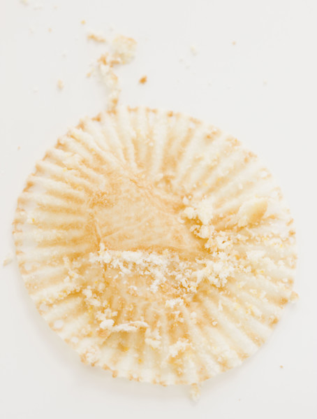 Close up of crumbs on muffin wrapper. Date : 2008
