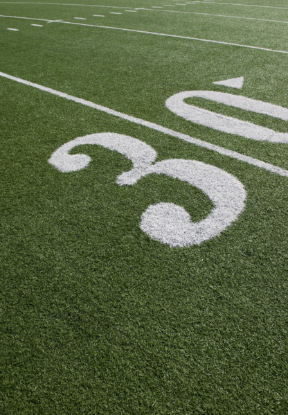 Thirty yard line on football field.