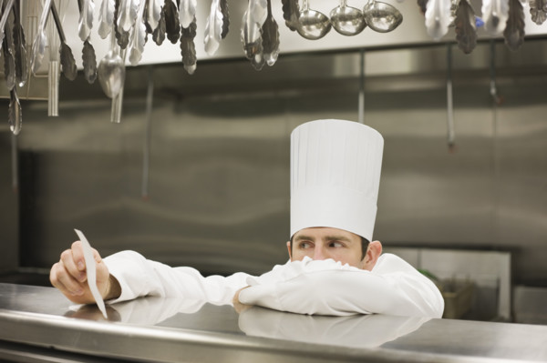 Frustrated chef reading ticket. Date : 2008