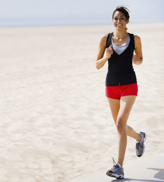 Woman running on beach. Date : 2008
