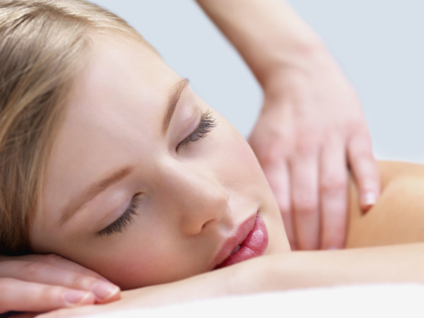 Young woman getting massage. Date : 2008