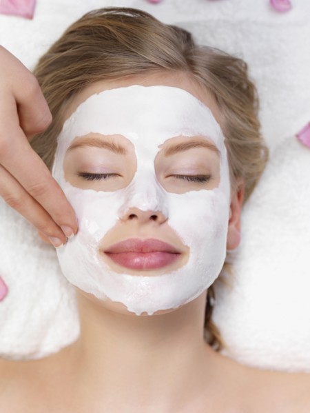 Young woman getting facial spa treatment. Date : 2008