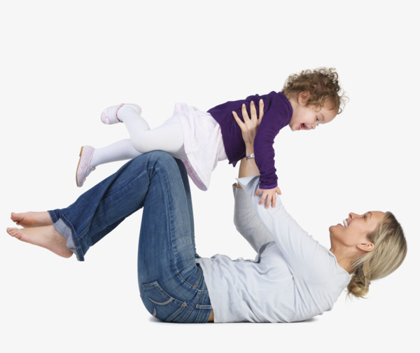 Mother lifting daughter into air. Date : 2008