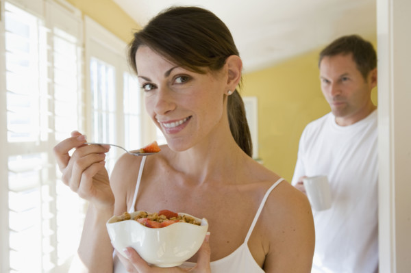 Couple eating breakfast. Date : 2008