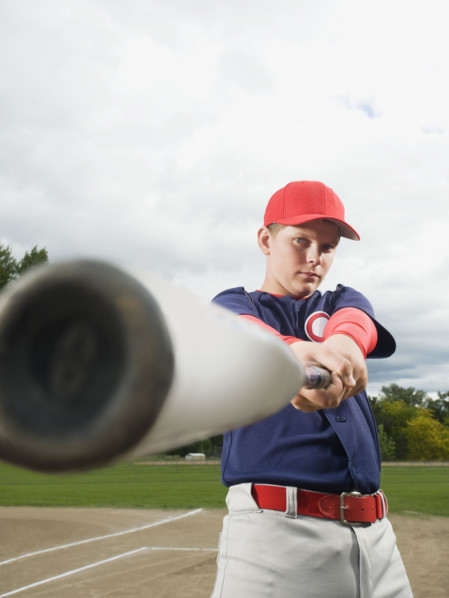 Baseball player swinging bat. Date : 2008