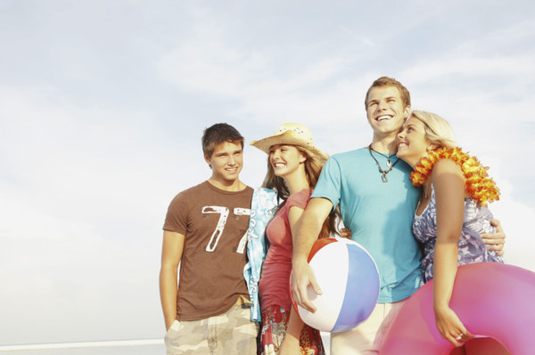 Friends having fun on beach. Date : 2008