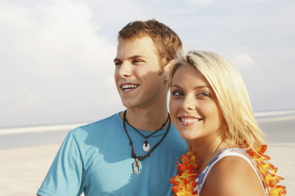 Young couple posing on beach. Date : 2008
