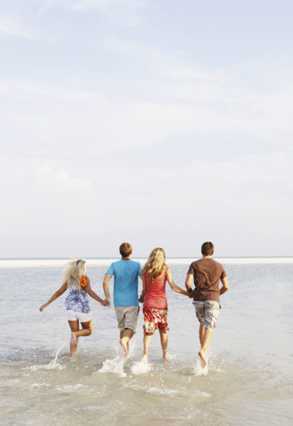 Friends running in ocean. Date : 2008
