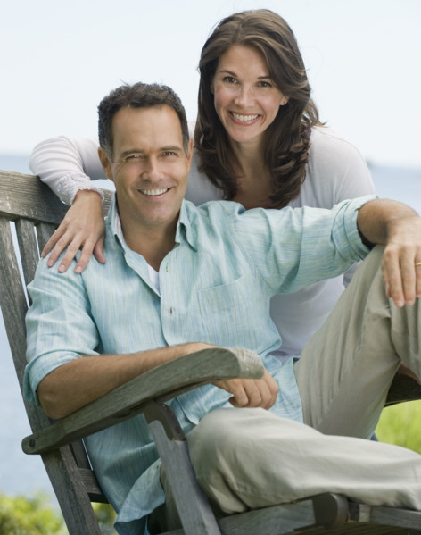 Portrait of couple outdoors.