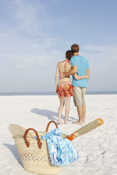 Couple hugging on beach. Date: 2008