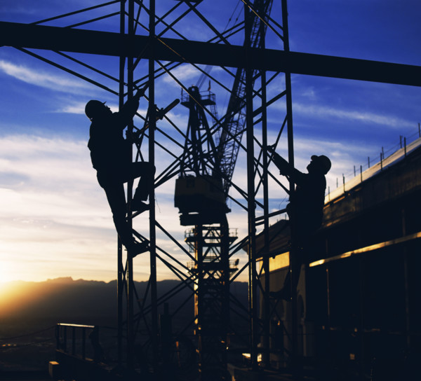 Workers climbing towers of construction site in Las Vegas. Date: 2008