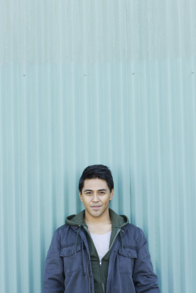 Man posing against wall. Date : 2008