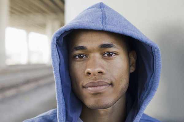 Close up of man wearing hoody. Date: 2008