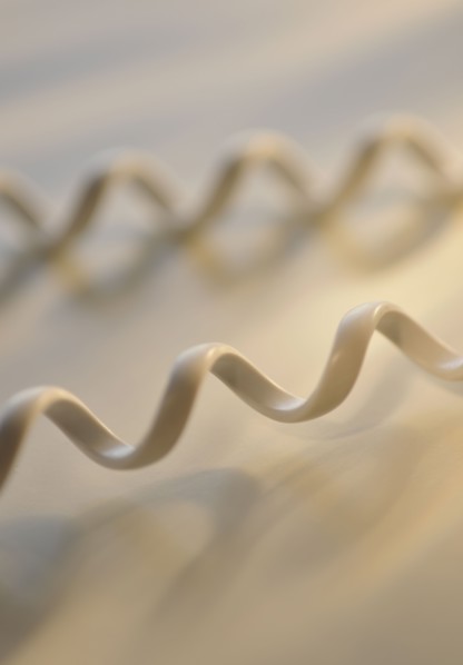 Close up of telephone cord.