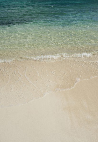 Beach and clear ocean water.