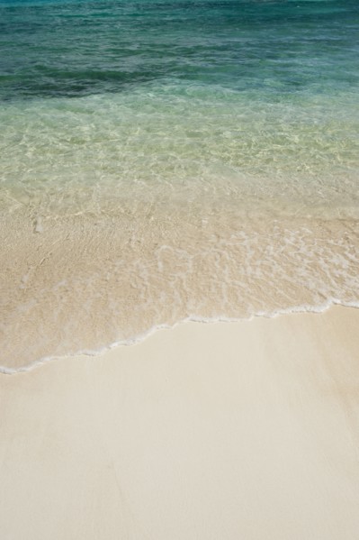 Beach and clear ocean water.