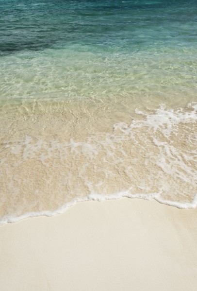 Beach and clear ocean water.