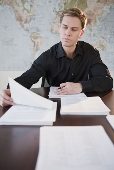 Businessman reviewing documents.