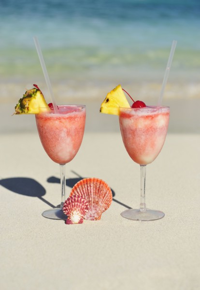Tropical drinks on beach.