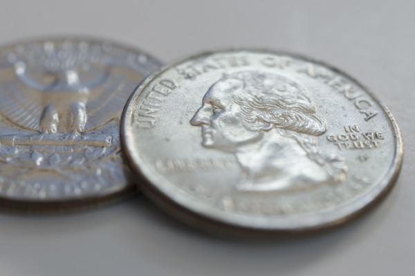 Close up of silver coins.