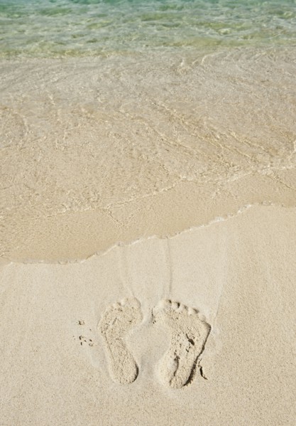 Footprints in sand.