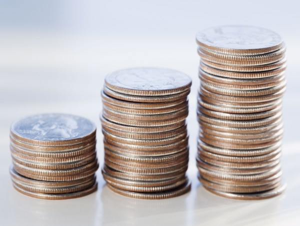 Stacks of coins. Photographe : Jamie Grill