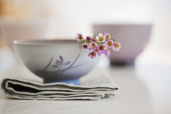 Tropical flowers in bowl.